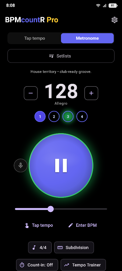 The metronome playing at 128 BPM in 4/4, with the third beat lit and controls for subdivision and count-in.